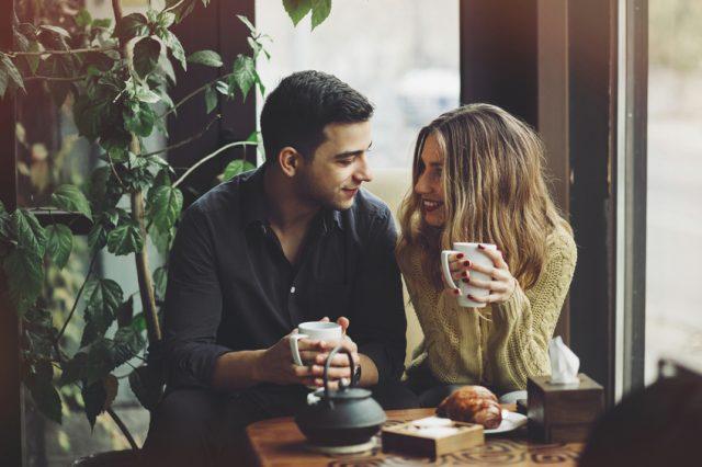 couple-in-love-drinking-coffee-in-coffee-shop-2-640x426